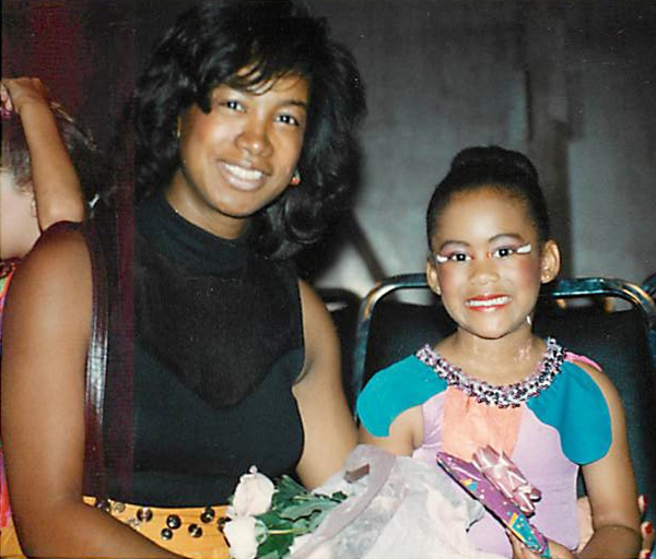 Jennifer congratulates daughter Nyckie at dance recital