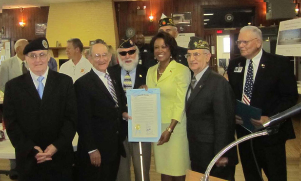 Jennifer presents resolution to the American Legion at Lake Ella to recognize their work on behalf of veterans